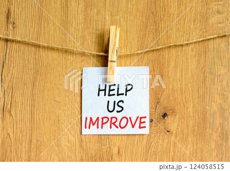 Help us improve symbol. Concept words Help us improve on beautiful white paper on clothespin. Beautiful wooden background. Business motivational help us improve concept. Copy space. Help us improve symbol. Concept words Help us improve on beautiful white paper on clothespin. Beautiful wooden background. Business motivational help us improve concept. Copy space. 124058515