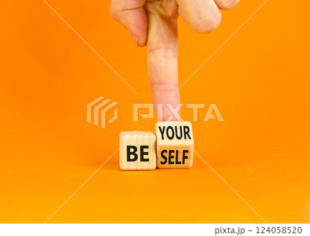 Motivational be yourself symbol. Concept words Be yourself on beautiful wooden block. Beautiful orange background Businessman hand. Business motivational be yourself concept. Copy space. Motivational be yourself symbol. Concept words Be yourself on beautiful wooden block. Beautiful orange background Businessman hand. Business motivational be yourself concept. Copy space. 124058520