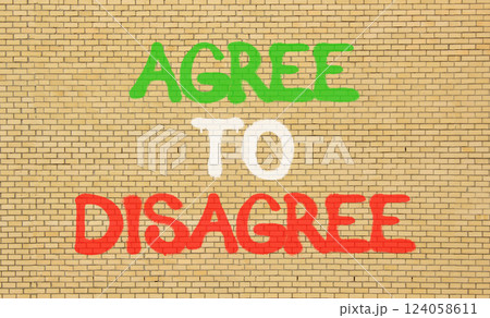 Agree to disagree symbol. Concept words Agree to disagree on beautiful brick wall . Beautiful brick wall background. Business and agree to disagree concept. Copy space. Agree to disagree symbol. Concept words Agree to disagree on beautiful brick wall . Beautiful brick wall background. Business and agree to disagree concept. Copy space. 124058611