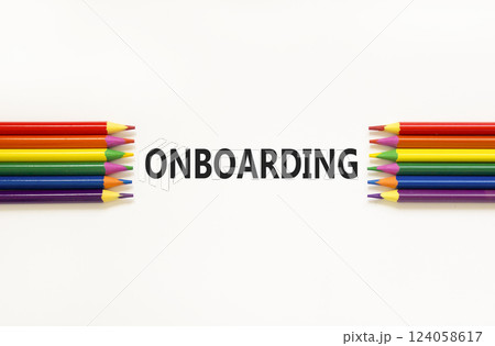 Onboarding success symbol. Concept word Onboarding on beautiful white paper. Beautiful white paper background. Beautiful colored pencils. Business onboarding success concept. Copy space. 124058617