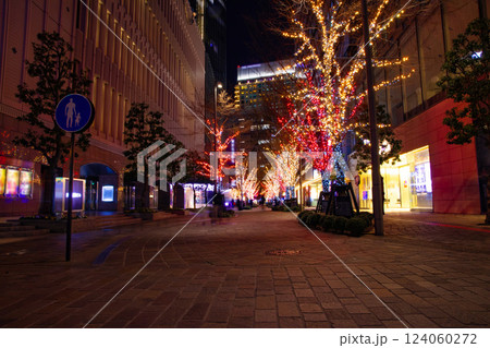 A cityscape of night illuminated street in Tokyo A cityscape of night illuminated street in Tokyo 124060272