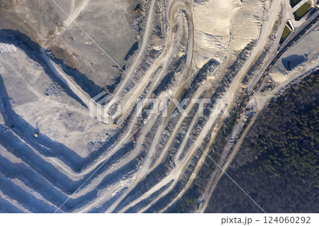 Open pit granite quarry, view from above Open pit granite quarry, view from above 124060292