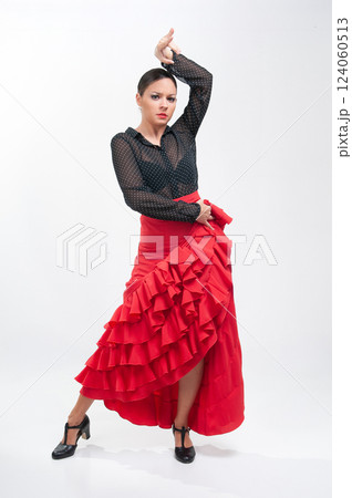 Spanish flamenco dancer in traditional dress isolated on white background for the April Fair 124060513