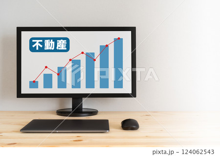 不動産の文字と右肩上がりのグラフが表示されている画面 124062543