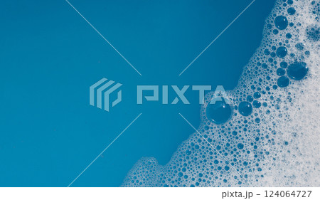 Detergent foam bubble on water. Blue background, Soap sud 124064727