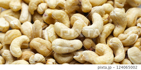 Cashew nuts on white background. Cashew nuts on white background. 124065002