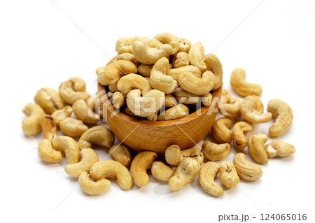 Cashew nuts on white background. Cashew nuts on white background. 124065016
