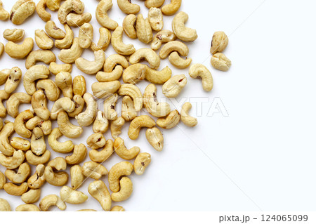 Cashew nuts on white background. 124065099