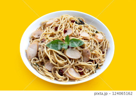 Spaghetti with dried chili and hot dogs 124065162