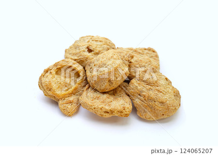 Textured soy protein on white background. Textured soy protein on white background. 124065207
