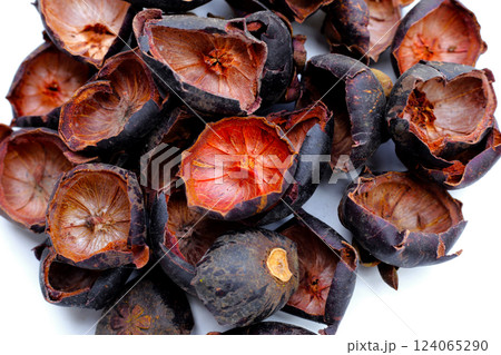 Dried mangosteen peels on white background. Dried mangosteen peels on white background. 124065290