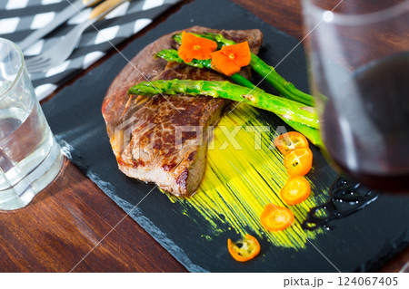 Well done beef steak with asparagus Well done beef steak with asparagus 124067405