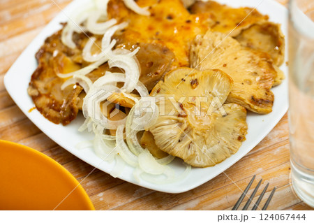 Pickled russula delica with onions 124067444
