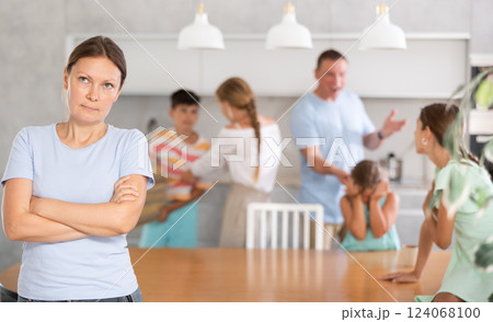 Irritated mom is tired of noise and screams of the children at home Irritated mom is tired of noise and screams of the children at home 124068100