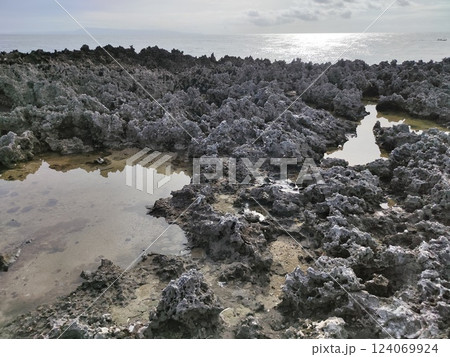 Water Blow Nusa Dua. Tourist attraction has a natural phenomenon with waves crashing, towering up to 8 meters slammed in the reefs. Bali, Indonesia. Water Blow Nusa Dua. Tourist attraction has a natural phenomenon with waves crashing, towering up to 8 meters slammed in the reefs. Bali, Indonesia. 124069924
