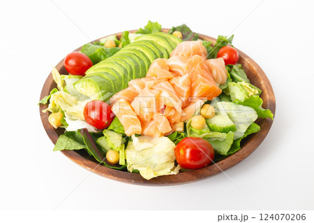 Avocado and Salmon Salad on a White Background Avocado and Salmon Salad on a White Background 124070206