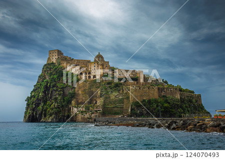 Ischia, Italy with Aragonese Castle in the Mediterranean at dusk Ischia, Italy with Aragonese Castle in the Mediterranean at dusk 124070493