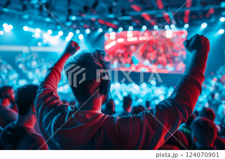 Esports Gamer Celebrating Victory in Tournament Esports Gamer Celebrating Victory in Tournament 124070901