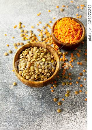 Healthy food, dieting, nutrition concept, vegan protein source. Raw of legumes red lentils and canadian lentils. Copy space. 124072296