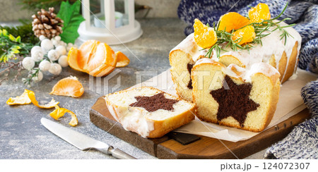 Winter dessert. Christmas chocolate star cupcake with sour cream frosting on the festive table. Banner. Winter dessert. Christmas chocolate star cupcake with sour cream frosting on the festive table. Banner. 124072307