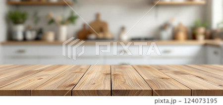 Wooden surface of a table with blurred kitchen background 124073195