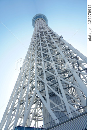 Tokyo, Japan - 2 March, 2025: Tokyo Skytree, a broadcasting and observation tower in Tokyo, Japan. Tokyo, Japan - 2 March, 2025: Tokyo Skytree, a broadcasting and observation tower in Tokyo, Japan. 124076913