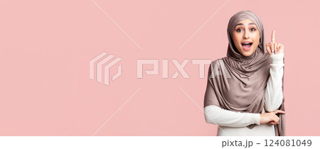 I Have Idea. Young Islamic Woman In Hijab Pointing Finger Up, Got Problem Solution, Pink Background With Empty Space I Have Idea. Young Islamic Woman In Hijab Pointing Finger Up, Got Problem Solution, Pink Background With Empty Space 124081049