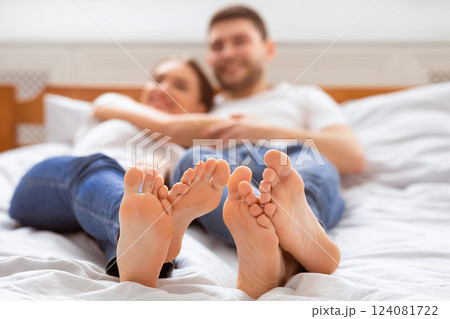 Morning Romance. Affectionate Couple Embracing Lying Together In Bed At Home. Selective Focus, Shallow Depth 124081722