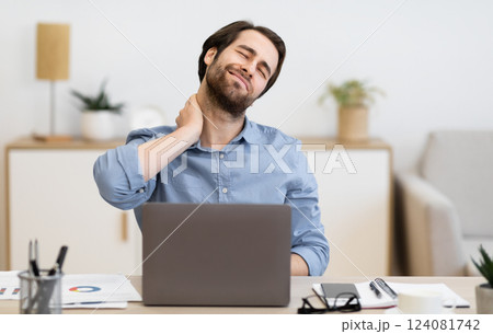 Neck Pain. Tired Businessman Massaging Aching Neck Having Health Problems After Computer Work Sitting At Laptop In Modern Office. Arthritis, Muscle Spasm And Poor Posture Concept. Selective Focus Neck Pain. Tired Businessman Massaging Aching Neck Having Health Problems After Computer Work Sitting At Laptop In Modern Office. Arthritis, Muscle Spasm And Poor Posture Concept. Selective Focus 124081742