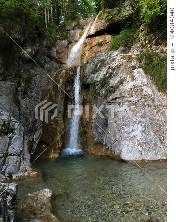 Mountain waterfall, with a beautiful landscape. 124084040