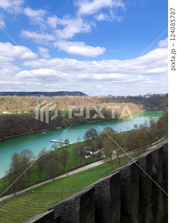 Turquoise river in a picturesque valley, Wittelsbach residence, under a blue sky Turquoise river in a picturesque valley, Wittelsbach residence, under a blue sky 124085787