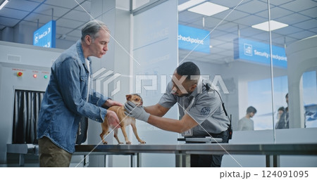 Airport Terminal: Mature Man with Pet at Security Checkpoint Airport Terminal: Mature Man with Pet at Security Checkpoint 124091095