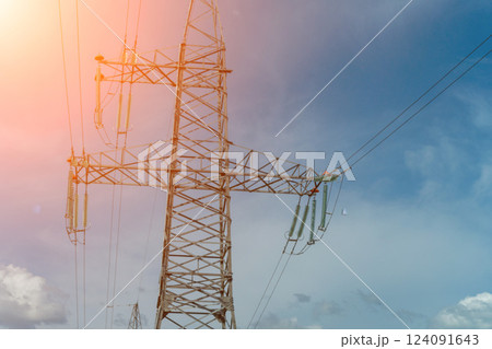 High voltage towers with sky background. Power line support with wires for electricity transmission. High voltage grid tower with wire cable at distribution station. Energy industry, energy saving High voltage towers with sky background. Power line support with wires for electricity transmission. High voltage grid tower with wire cable at distribution station. Energy industry, energy saving 124091643