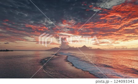 Breathtaking sunset illuminating the sky with vibrant colors over the tranquil waters of French Polynesia, with Moorea island creating a picturesque silhouette against the fiery backdrop Breathtaking sunset illuminating the sky with vibrant colors over the tranquil waters of French Polynesia, with Moorea island creating a picturesque silhouette against the fiery backdrop 124093341
