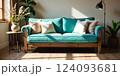 Recycled teal sofa and wooden floors in an eco-friendly living space 124093681