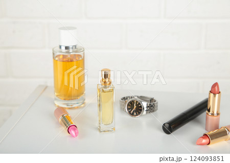 Cosmetic set on light dressing table on light background Cosmetic set on light dressing table on light background 124093851