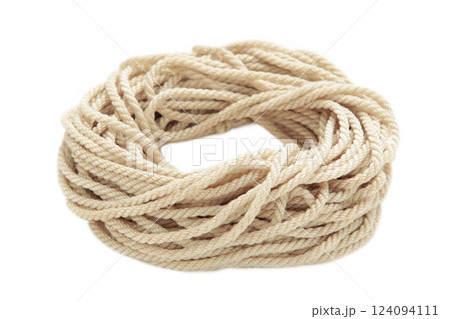 Coil of rope isolated on a white background close up Coil of rope isolated on a white background close up 124094111