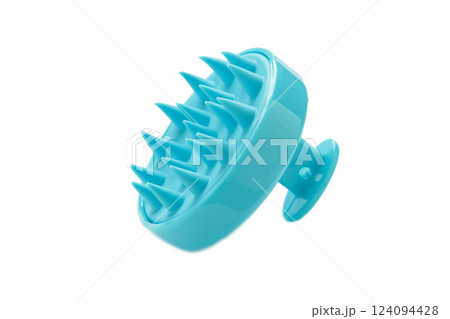 Brush for hair growth stimulating brush. Massage brush isolated on white background Brush for hair growth stimulating brush. Massage brush isolated on white background 124094428