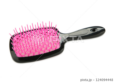 Plastic hairbrush isolated on white background. 124094448