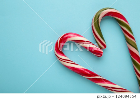 Nice christmas candy heart on blue background. Space for text 124094554