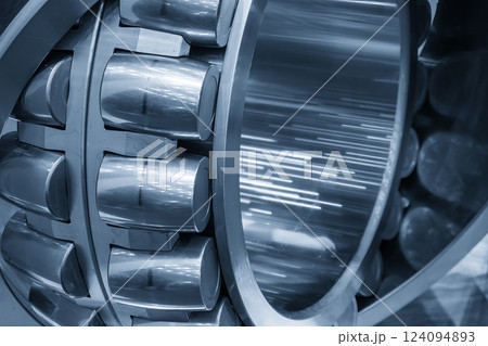 Close up scene the cylindrical rolling bearing parts in the light blue scene. Close up scene the cylindrical rolling bearing parts in the light blue scene. 124094893