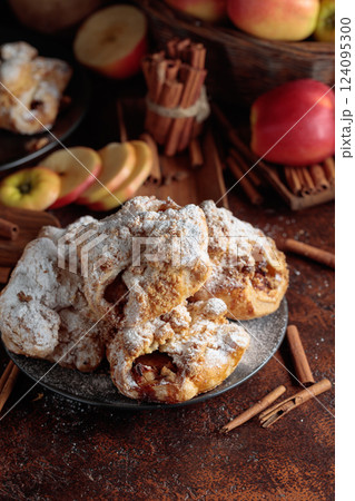Homemade mini apple strudels with apples and cinnamon. Homemade mini apple strudels with apples and cinnamon. 124095300