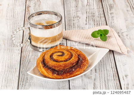 Homemade cinnabon swirl pastry with cinnamon Homemade cinnabon swirl pastry with cinnamon 124095487