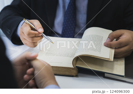 Lawyer meeting and consult with client. Consultation of businesswoman and lawyer. Treaty of the law. Law and Legal services concept. 124096300