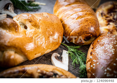 Pie and homemade bread, pizza or pie ingridients, food flat lay on kitchen table background. Working with butter, milk, yeast, flour, eggs, sugar pastry or bakery cooking. Text space Pie and homemade bread, pizza or pie ingridients, food flat lay on kitchen table background. Working with butter, milk, yeast, flour, eggs, sugar pastry or bakery cooking. Text space 124096448