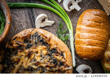 Pie and homemade bread, pizza or pie ingridients, food flat lay on kitchen table background. Working with butter, milk, yeast, flour, eggs, sugar pastry or bakery cooking. Text space Pie and homemade bread, pizza or pie ingridients, food flat lay on kitchen table background. Working with butter, milk, yeast, flour, eggs, sugar pastry or bakery cooking. Text space 124096456