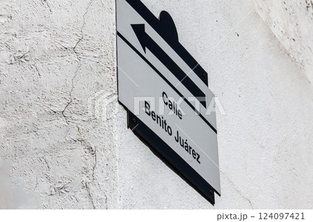Sign of the Benito Juarez street at the beautiful colonial Magical Town of Taxco de Alarcon located in the Mexican state of Guerrero. 124097421