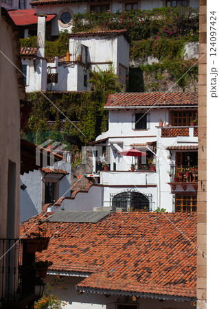 View of the beautiful colonial Magical Town of Taxco de Alarcon located in the Mexican state of Guerrero. View of the beautiful colonial Magical Town of Taxco de Alarcon located in the Mexican state of Guerrero. 124097424