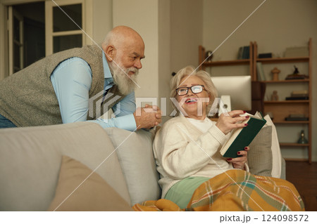 Loving senior married couple bonding and happy retirement pastime together Loving senior married couple bonding and happy retirement pastime together 124098572