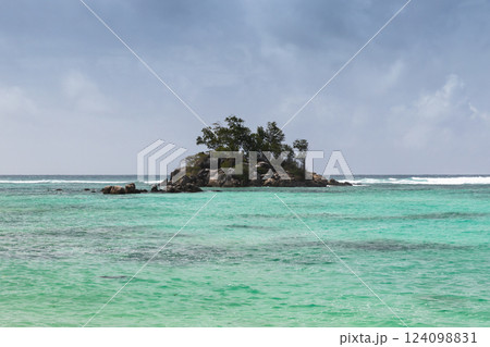 A picturesque view of a small tropical island A picturesque view of a small tropical island 124098831